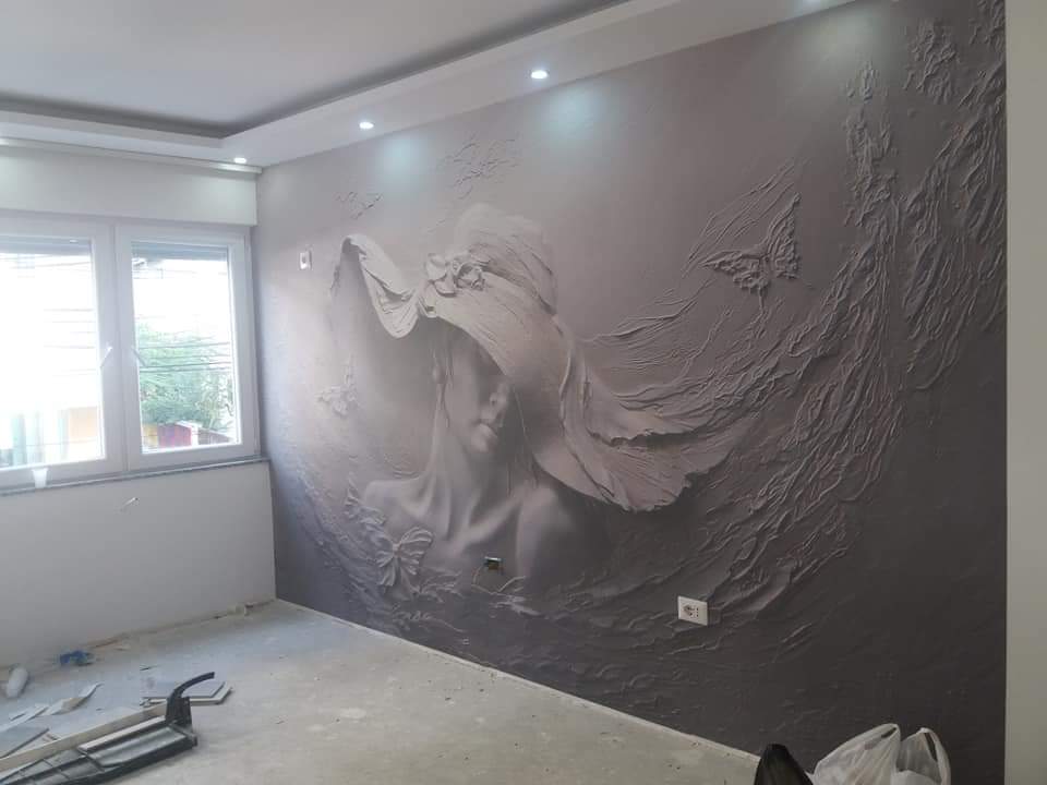 Kunstvolle Fototapete als Wandgestaltung in einem Schlafzimmer
